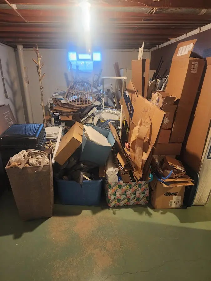 Roll-off dumpster container at job site for Roll Off Dumpster Rental in Lindsborg